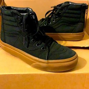 Black high top gummy sole vans